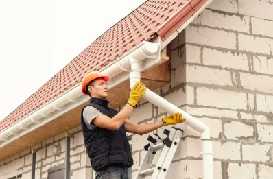 Pose et remplacement de gouttières au Quartier